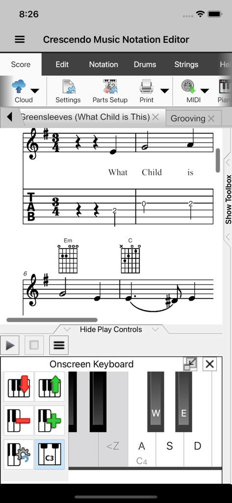 Crescendo Music - Oberfläche der Crescendo Music App, die Noten mit Gitarrentabs und einem Bildschirmkeyboard zeigt