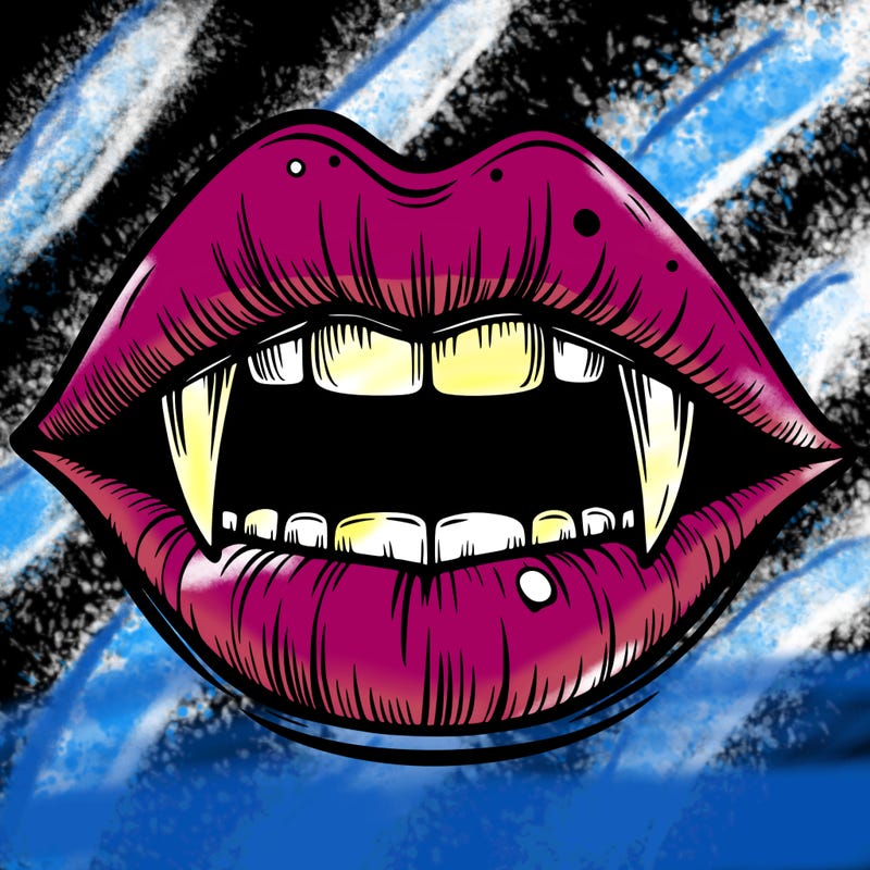 lips with vampire teeth