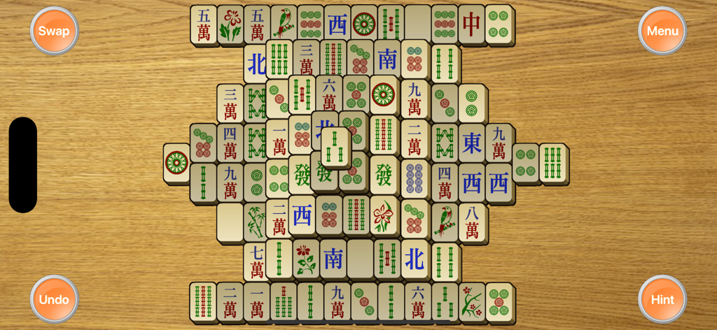 Classic Mahjong solitaire board with large tiles and simple navigation buttons on a wooden background