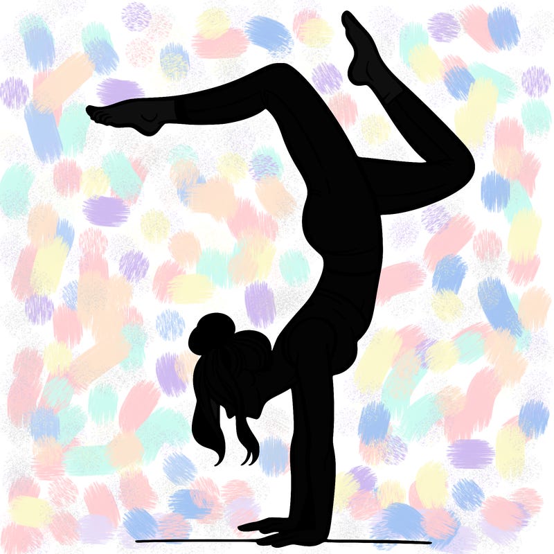 a woman doing a handstand