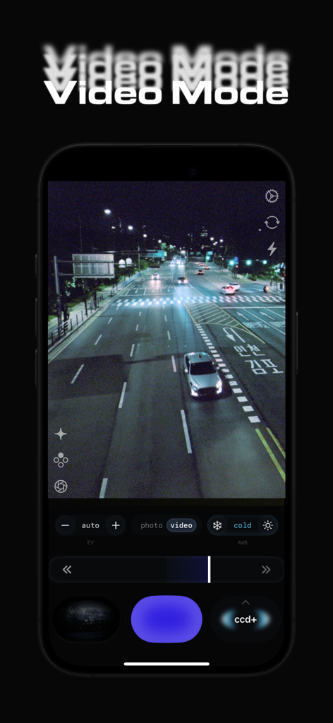 CoreCam - CoreCam app interface in video mode showing a grainy night street view with vintage digital camera effects
