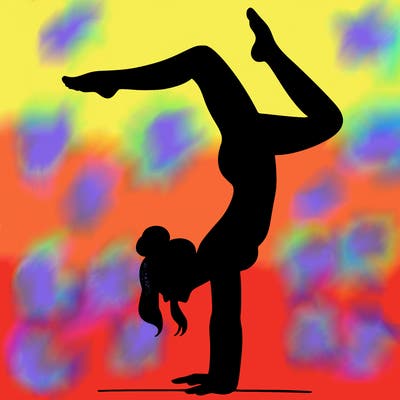 a woman doing a handstand