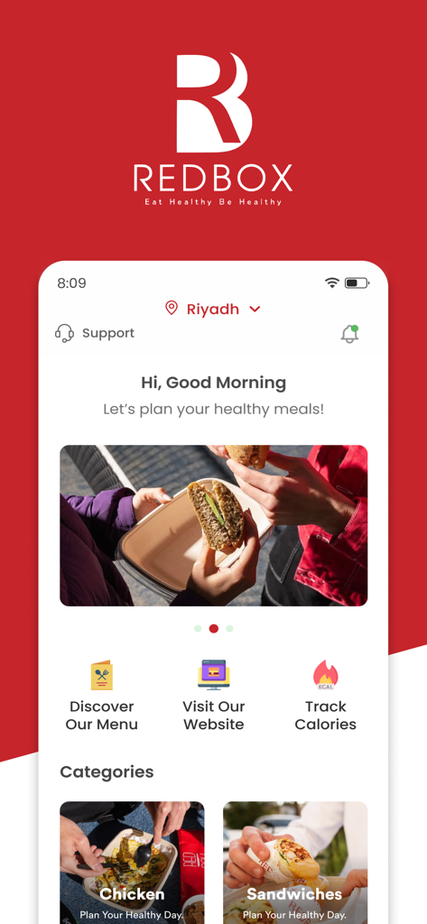 Redbox healthy food - Pantalla de inicio de la app Redbox Healthy Food mostrando opciones de comidas como pollo y sándwiches con funciones para rastrear calorías y descubrir el menú.