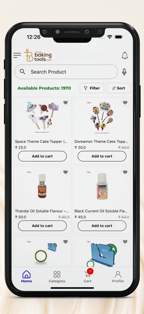 The Baking Tools - Mobile app interface of The Baking Tools showing a variety of cake toppers and food flavorings available for purchase.