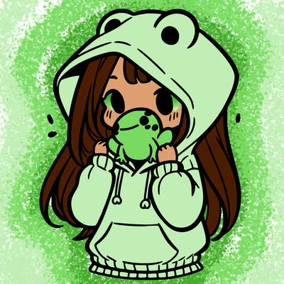 a girl holding a froggy hoodie