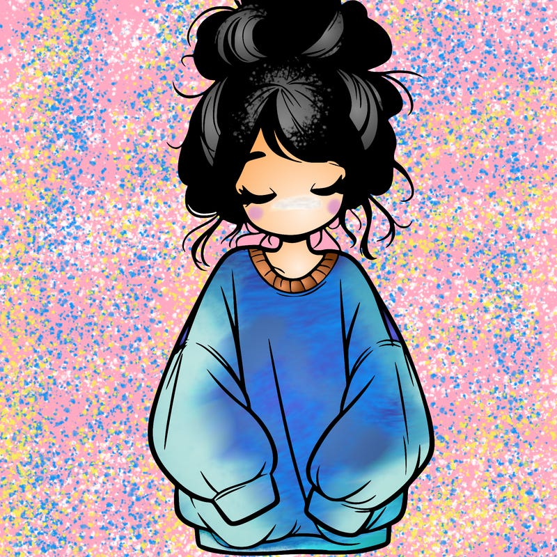 girl with baggy sweatshirt and messy bun
