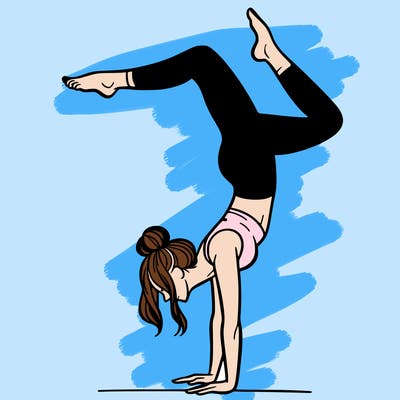 a woman doing a handstand