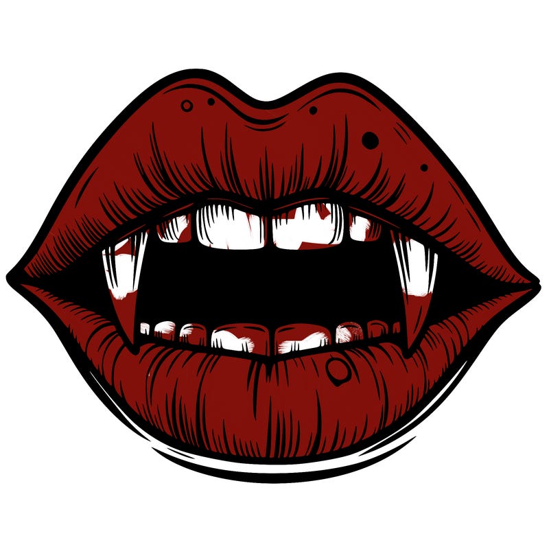 lips with vampire teeth