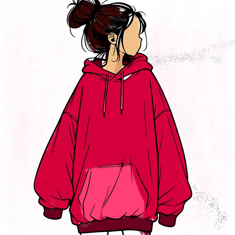 realistic girl with a oversized sweatshirt on and a bun