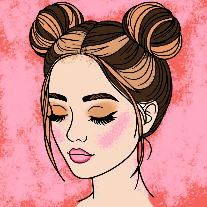 woman with hair buns
