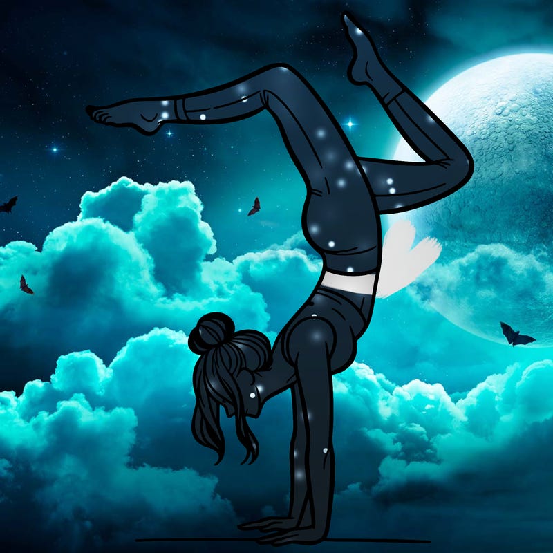 a woman doing a handstand