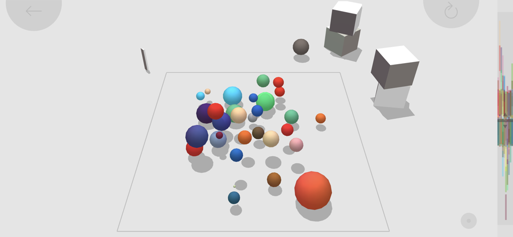 4D Toys - A sandbox scene in 4D Toys showing colorful spheres and cubes demonstrating fourth-dimensional physics.