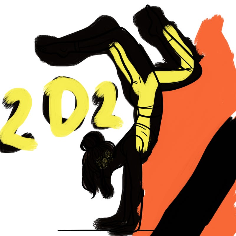 a woman doing a handstand