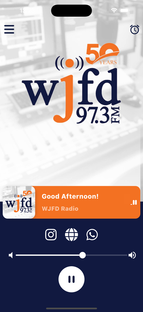 Interface of the Radio WJFD app displaying the live player and 97.3 FM logo