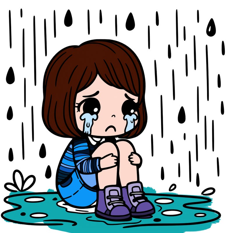 girl crying sitting in the rain