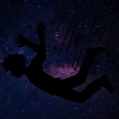 a silhouette of someone falling