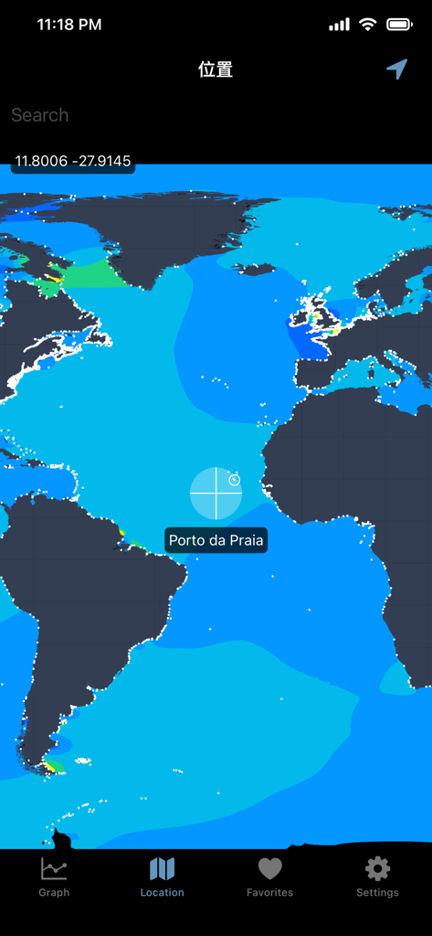 World map interface showing tide prediction stations and a selected location in the Atlantic