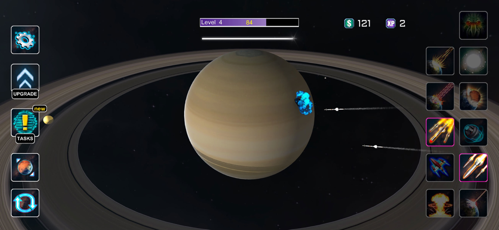Planet Smash Destruction Games - Gameplay screenshot of Planet Smash showing a ringed planet being attacked by missiles and blue energy blasts