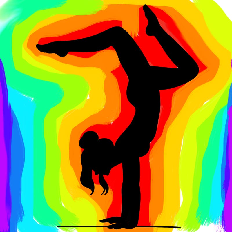 a woman doing a handstand