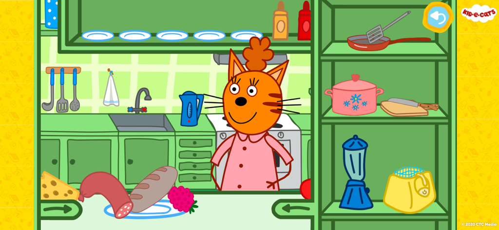 A day with Kid-E-Cats - Candy la gata en una cocina verde con pan, queso y una tetera azul