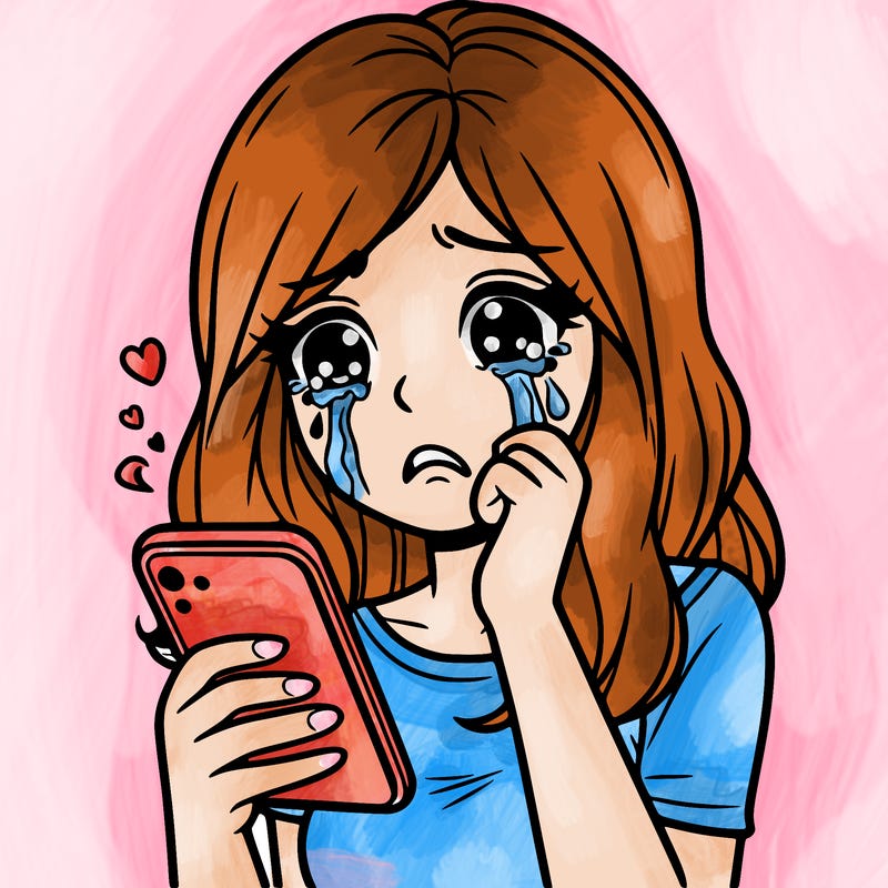 woman crying with her phone in her hand