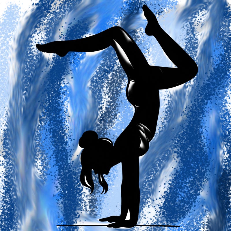 a woman doing a handstand