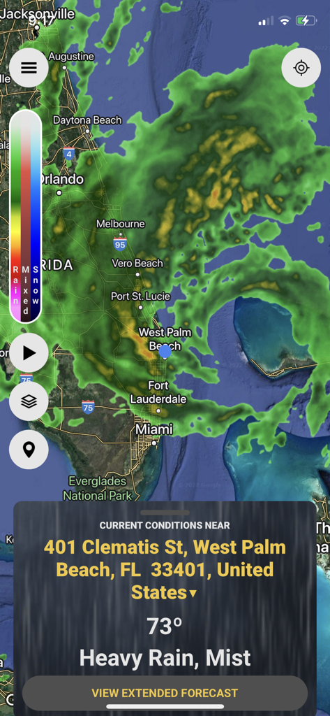 StormWatch plus mobile app showing a heavy rain weather radar map and current conditions for West Palm Beach Florida