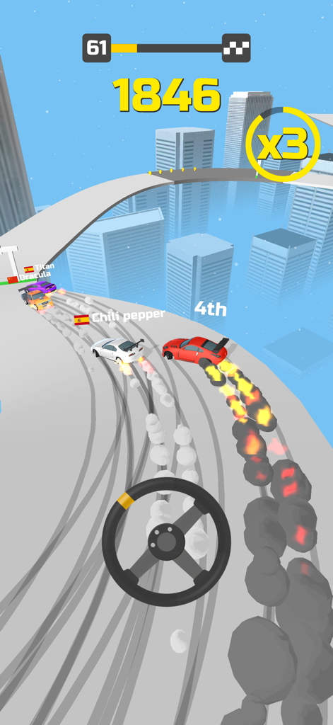 Red and white cars drifting on a curved track with city buildings in the background