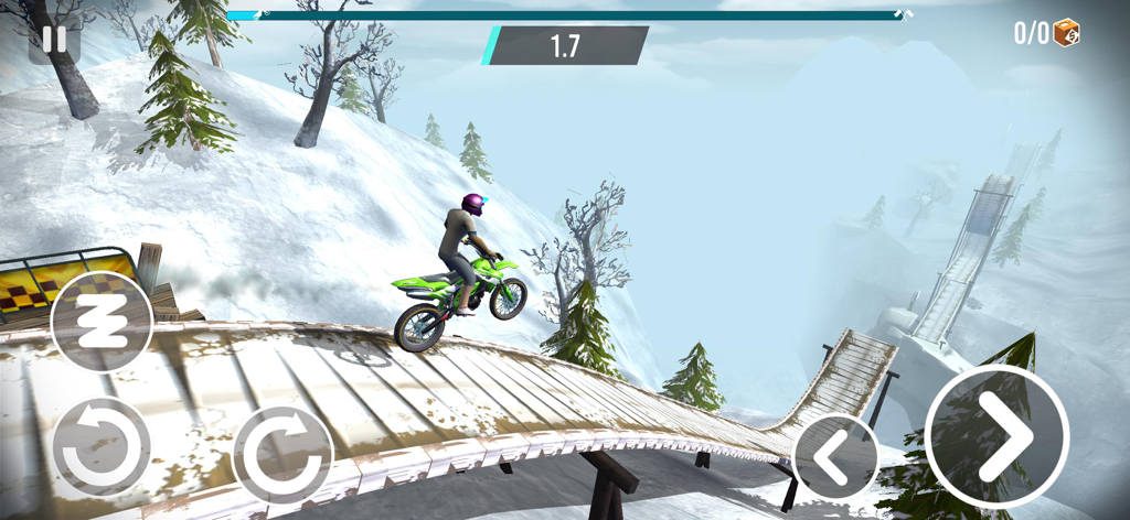 Un piloto de motocross en una moto de cross verde realiza un salto en una pista de montaña nevada