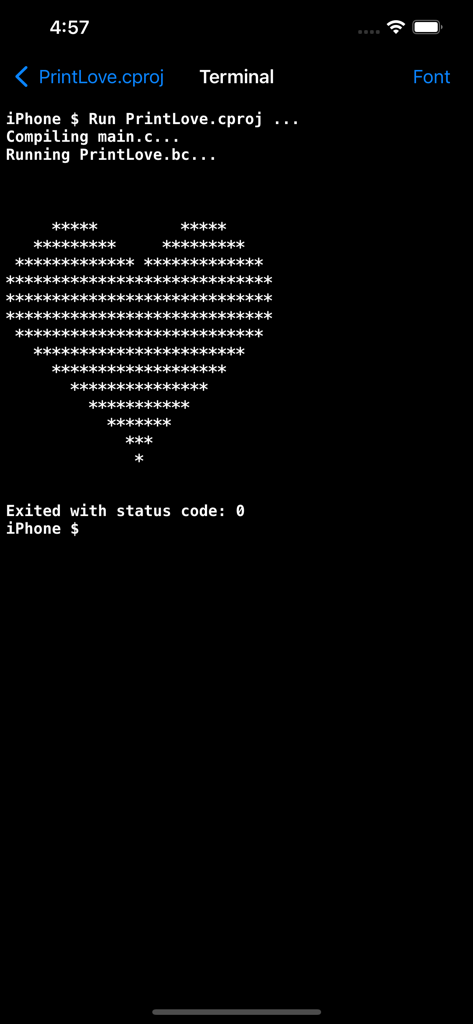 Mobile terminal screen showing successful compilation of a C program with an ASCII heart output
