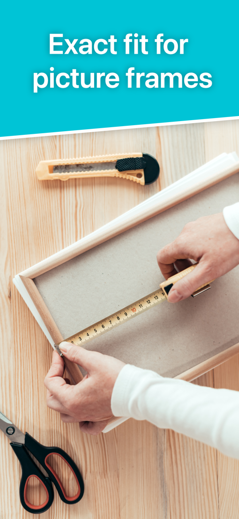 Print to Size - Person using a tape measure on a picture frame for precise photo printing