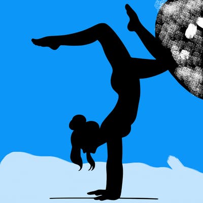 a woman doing a handstand