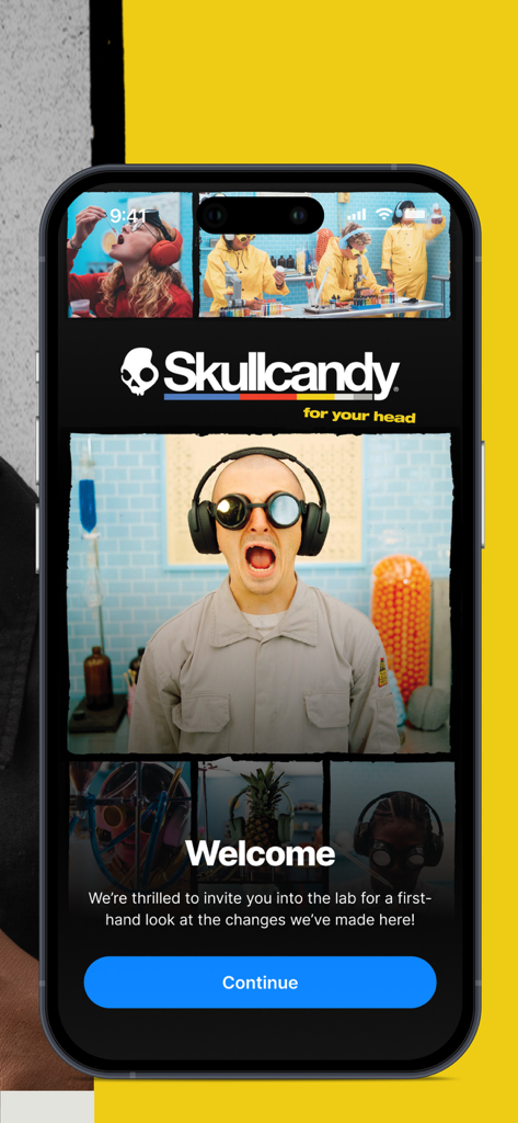 Skullcandy - Skullcandy mobile app welcome screen with laboratory themed imagery and a continue button