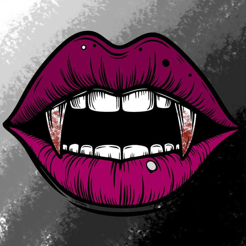 lips with vampire teeth