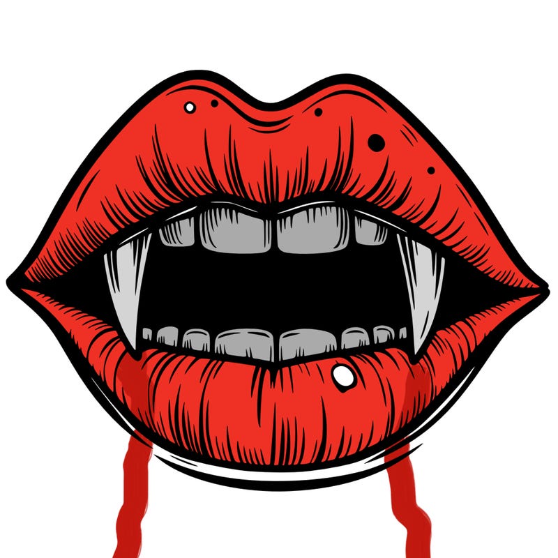 lips with vampire teeth