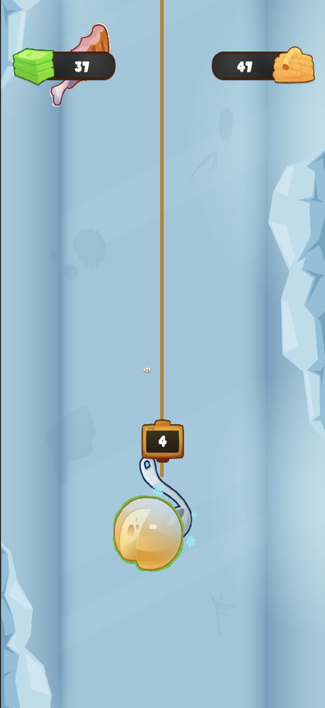 Freezer Frenzy - A fishing hook catching a round food ingredient in an icy freezer environment.