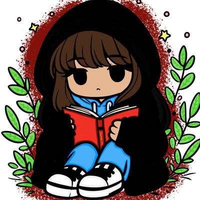 girl in oversized hoodie reading a book