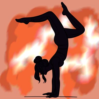 a woman doing a handstand