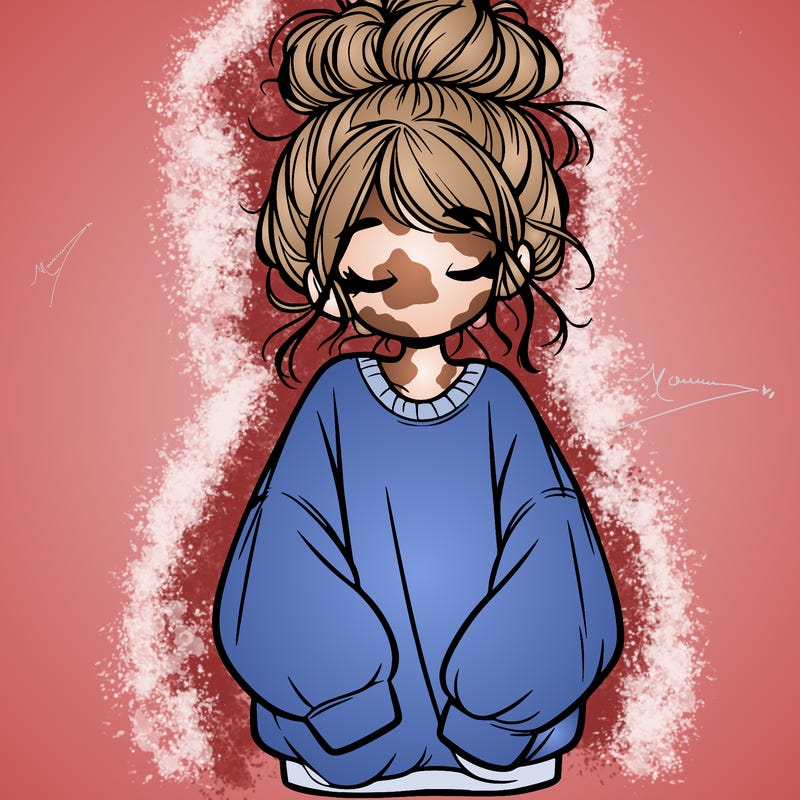 girl with baggy sweatshirt and messy bun