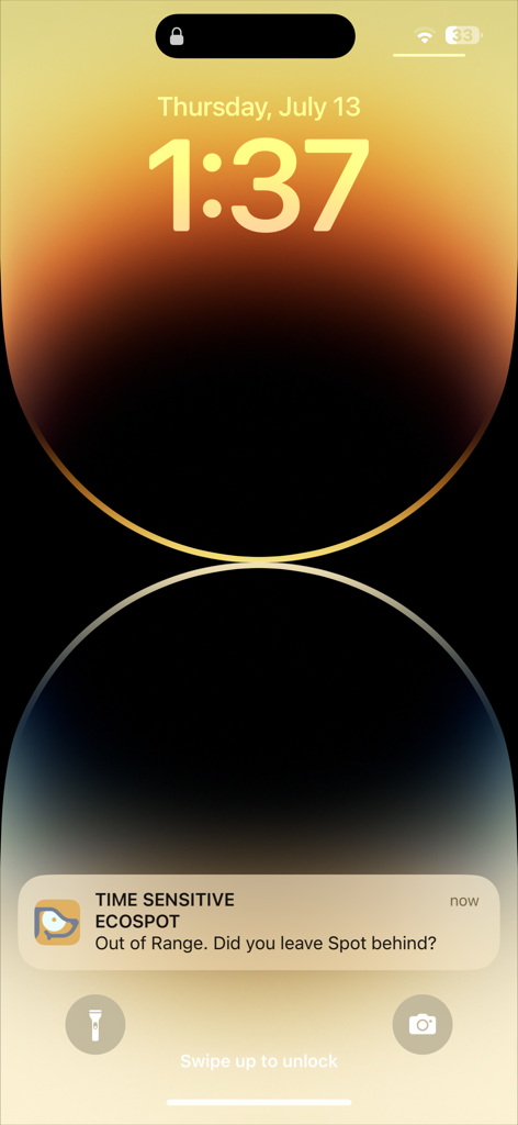 iPhone lock screen showing a time sensitive out of range notification from the ECOSPOT app