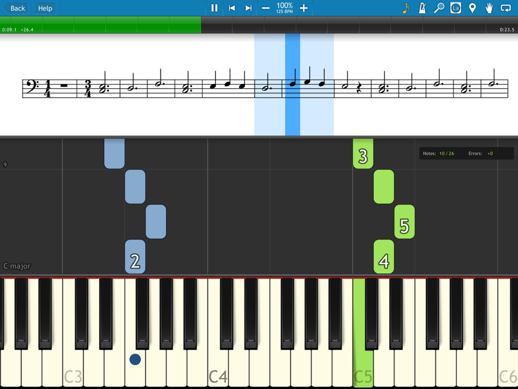 Synthesia app interface showing traditional sheet music and falling note blocks over a piano keyboard