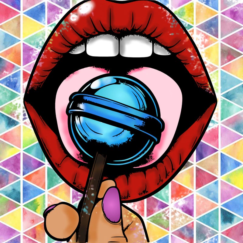 a mouth holding a loly pop and is realistic