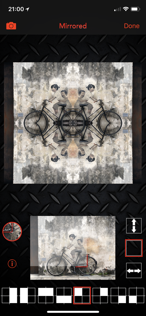 Interfaz de la aplicación Mirrored mostrando un efecto caleidoscópico aplicado a una foto de un mural de bicicleta.