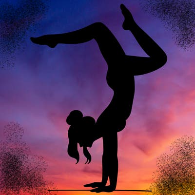 a woman doing a handstand