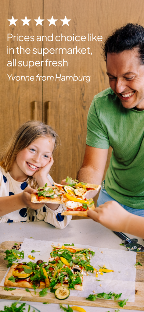 A father and young daughter enjoying fresh pizza together with a 5 star review for Picnic Online Supermarket