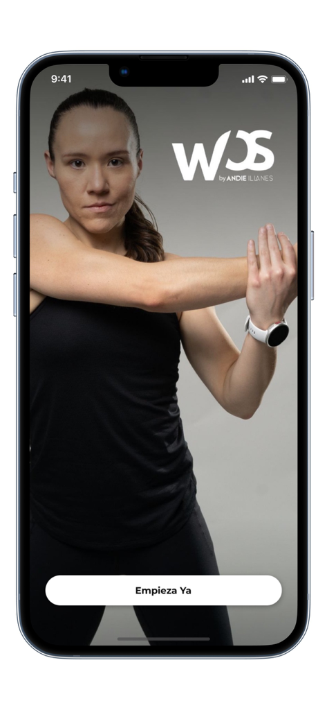 Pantalla de inicio de la aplicación de fitness wOS by Andie con la entrenadora Andie Illanes estirando.