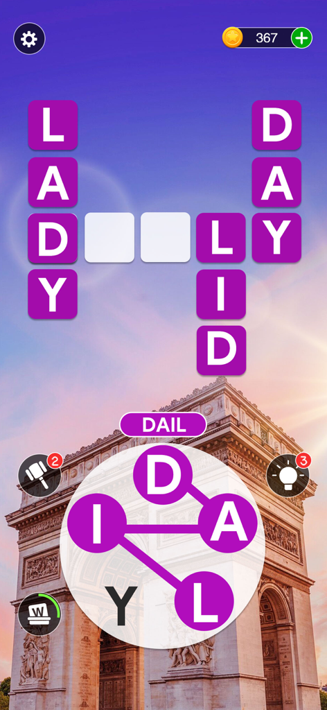 Eine Wortverbindungs-Puzzle-Oberfläche mit einem Buchstabenrad über einem Hintergrund des Arc de Triomphe in Paris