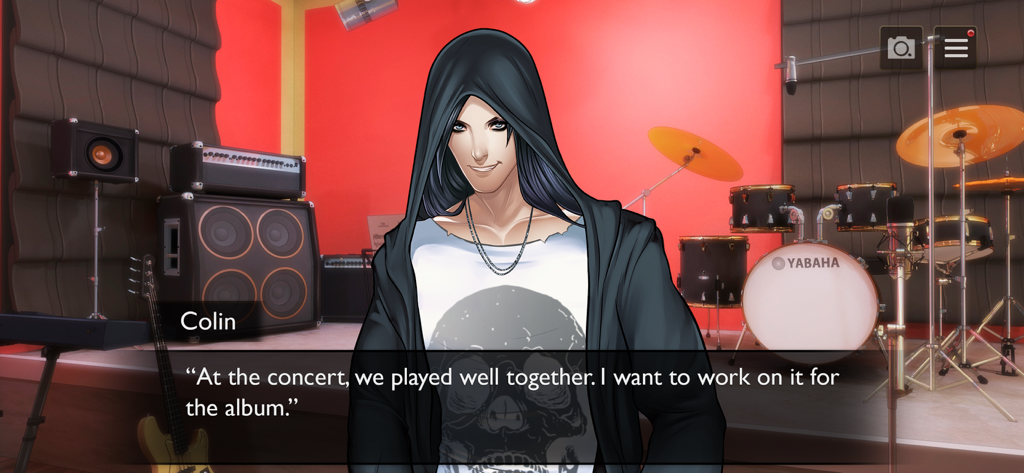 Colin the rock star talking in a music recording studio in Is It Love Colin Romance