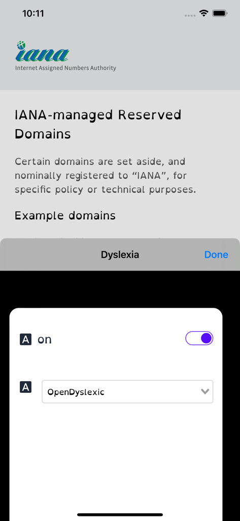 Dyslexia abc Safari extension menu showing the OpenDyslexic font option enabled on a webpage