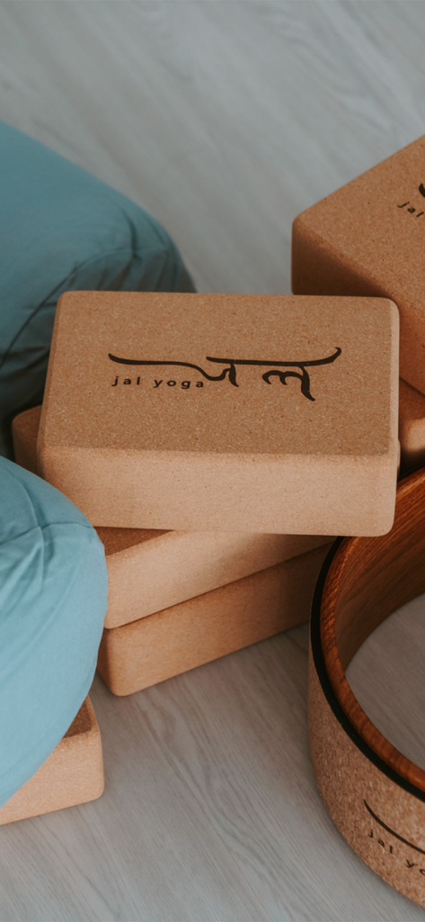 Jal Yoga - Branded cork yoga blocks and a yoga wheel from Jal Yoga studio